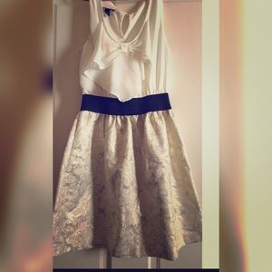 White ruffle dress with black belt